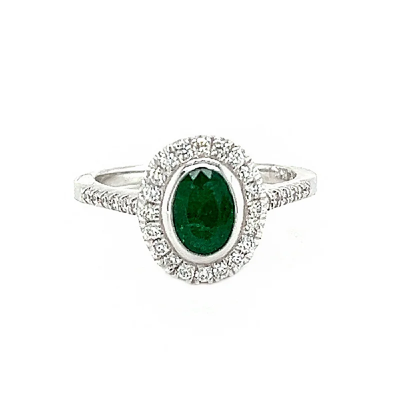 Oval Emerald and Diamond Halo Ring