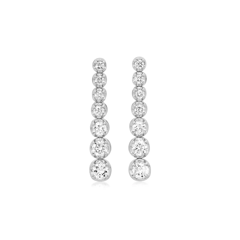 White Gold Graduated Diamond Tennis Studs