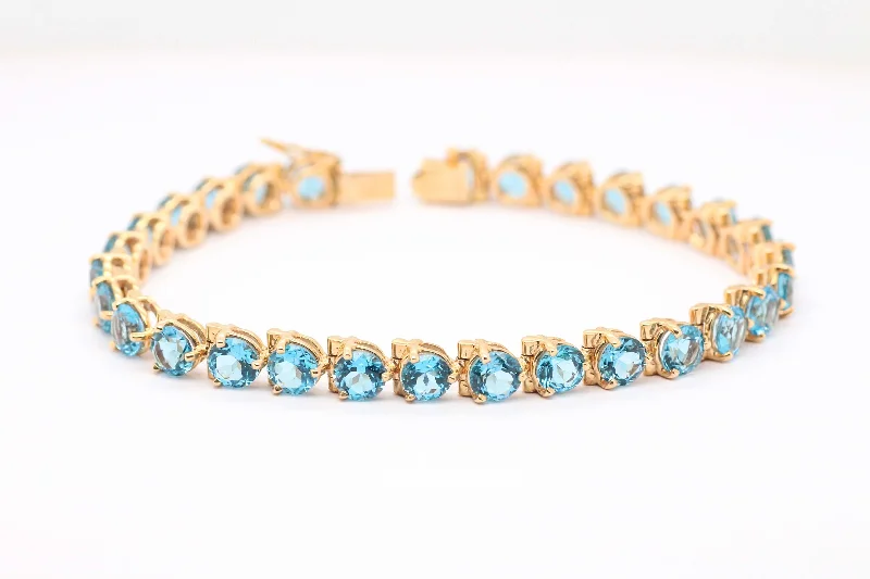 14KY BLUE TOPAZ BRACELET