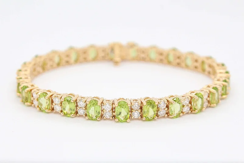 14KY 12.70 CTTW PERIDOT AND DIAMOND BRACELET, 2.30 CTTW